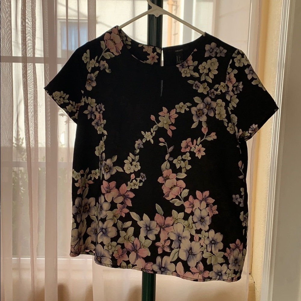 Floral black blouse.